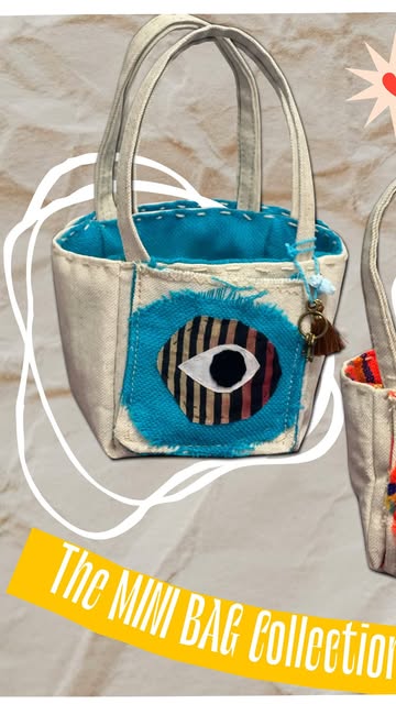 Mini canvas bag with a turquoise eye patch